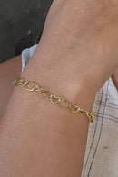 Pulseira Com Elos Ovais Intercalados Com Elos De Corações Banhado Em Ouro 18k Cor:dourado