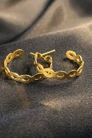 Brinco Argola Média Com Vazados Ovais Banhado Em Ouro 18k Cor:dourado